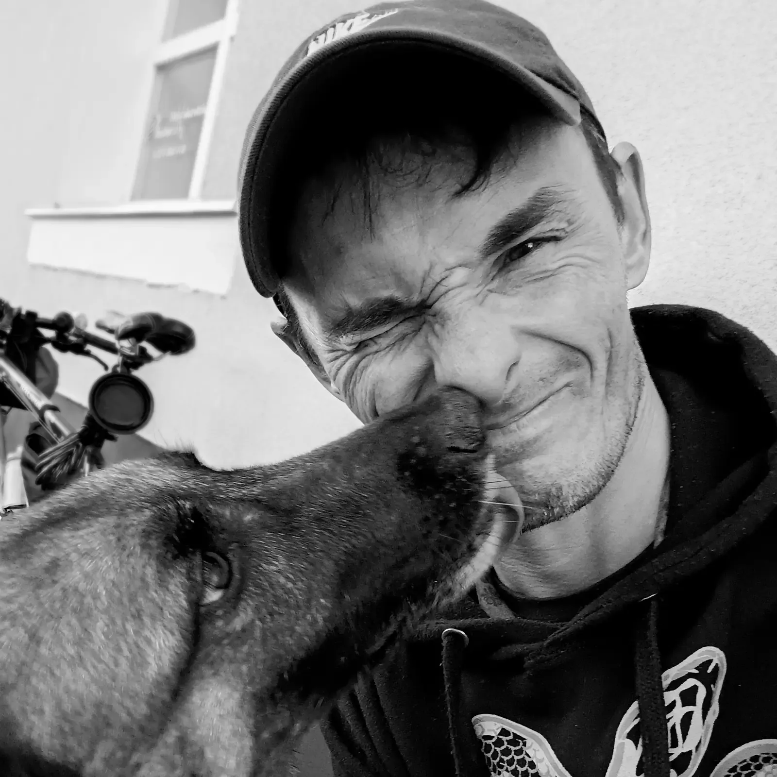 Rico, a Belgian Malinois and Greg, the author of this site.